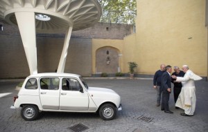 Pope Francis receives a vintage Renault 4 to serve as Vatican wheels